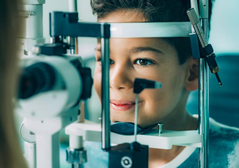 child receiving eye exam